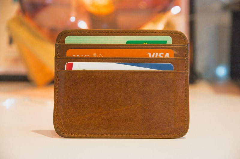 A slim wallet with credit cards inside