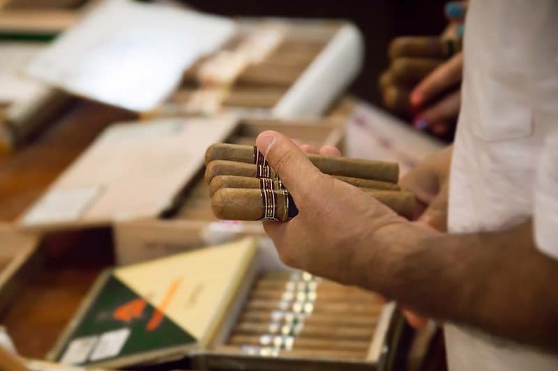 Person buying cigars at a high-risk merchant who uses payment processing solutions.