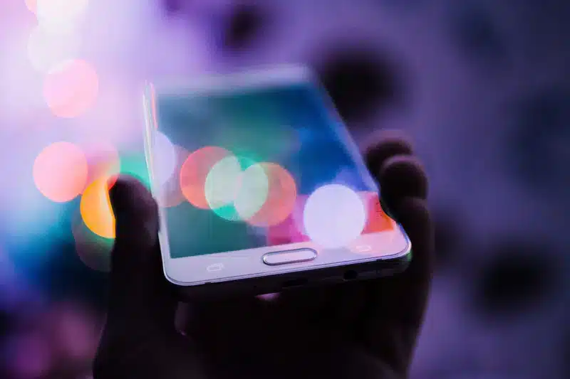 a phone with blurred, circular lights