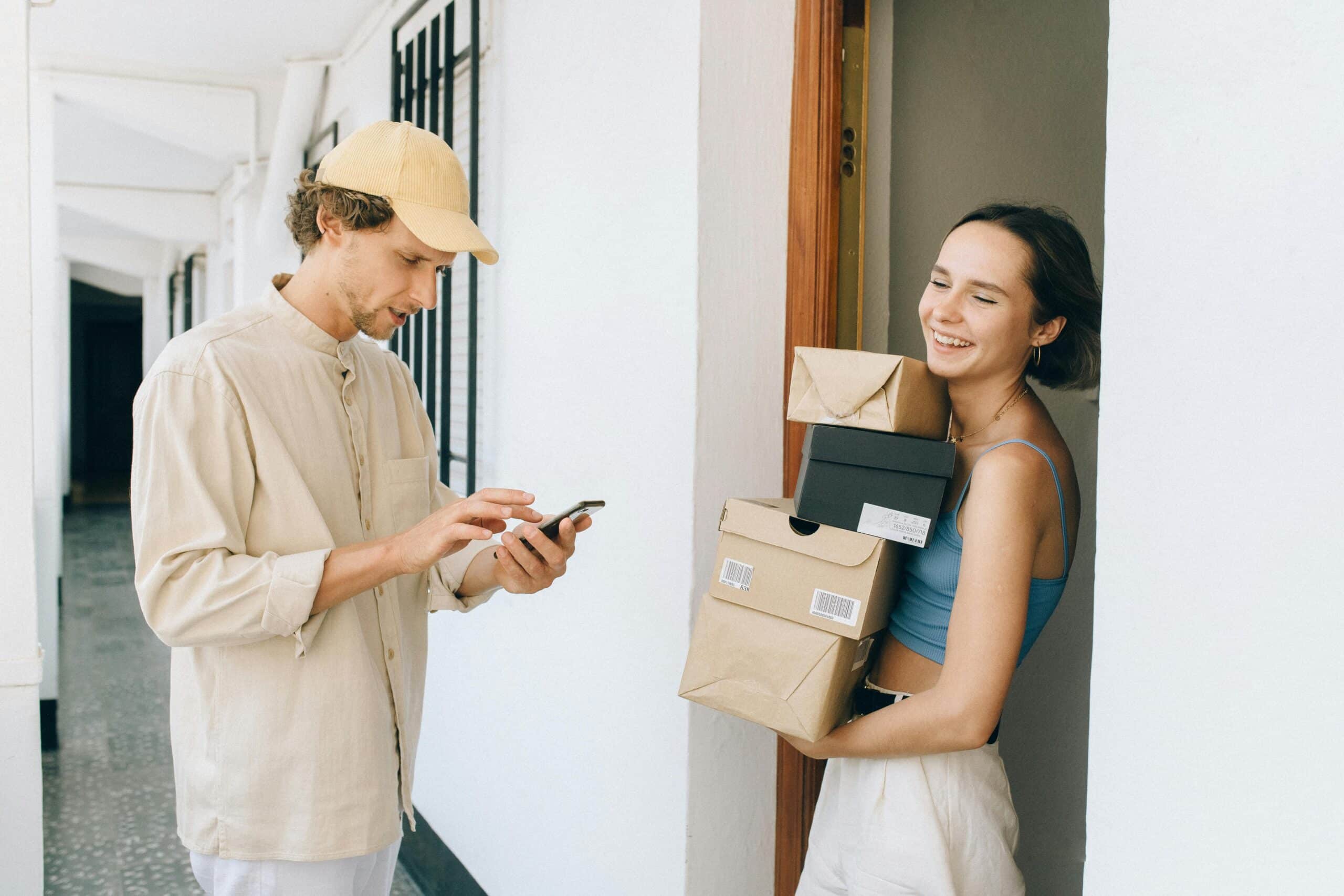 Person receiving packages at their door