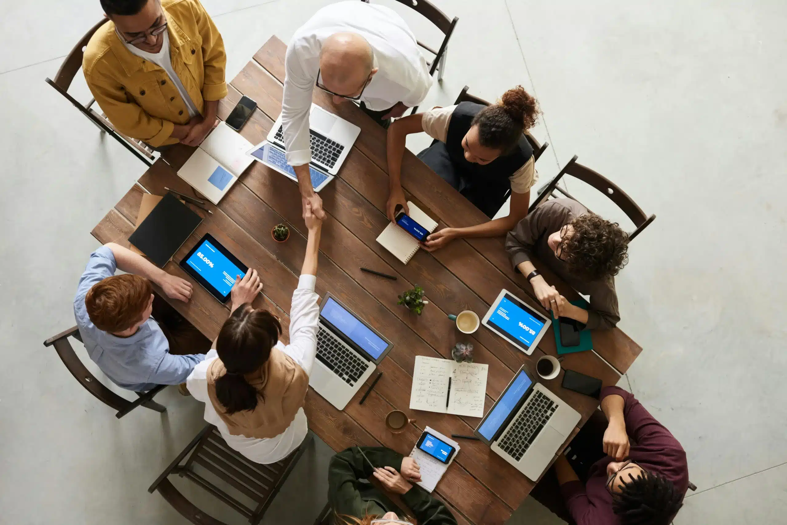 A table with 8 people meeting.