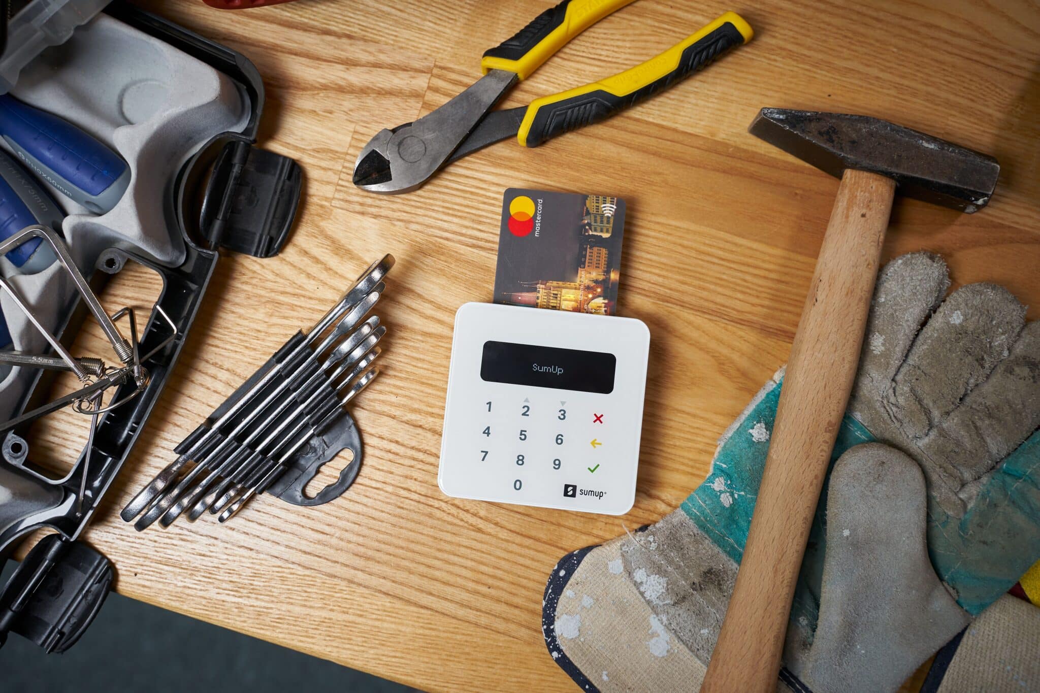 Credit repair image showing credit card on workbench processing payment